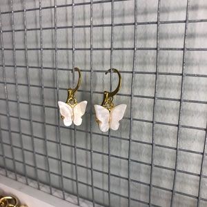 White butterfly earrings